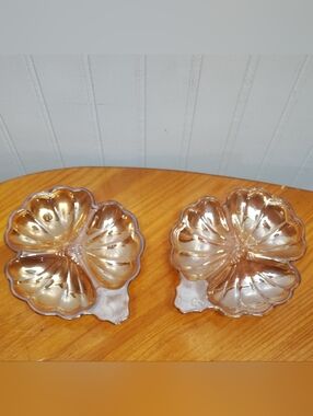 Pair of iridescent marigold carnival glass clover-shaped candy dishes
